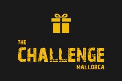 Yellow gift icon above 'The Challenge Mallorca' in yellow on black.